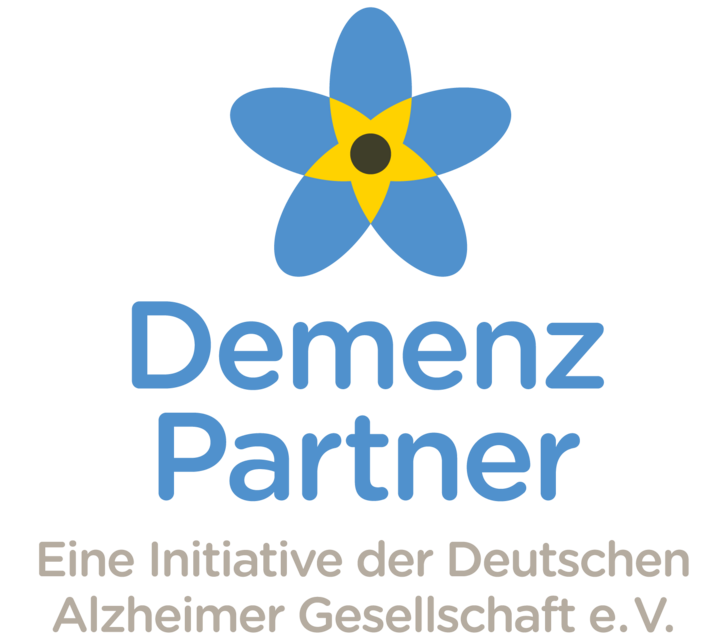 Logo Demenz Partner (blaue, stilisierte Blume mit schwarzem Mittelpunkt und gelben Elementen)